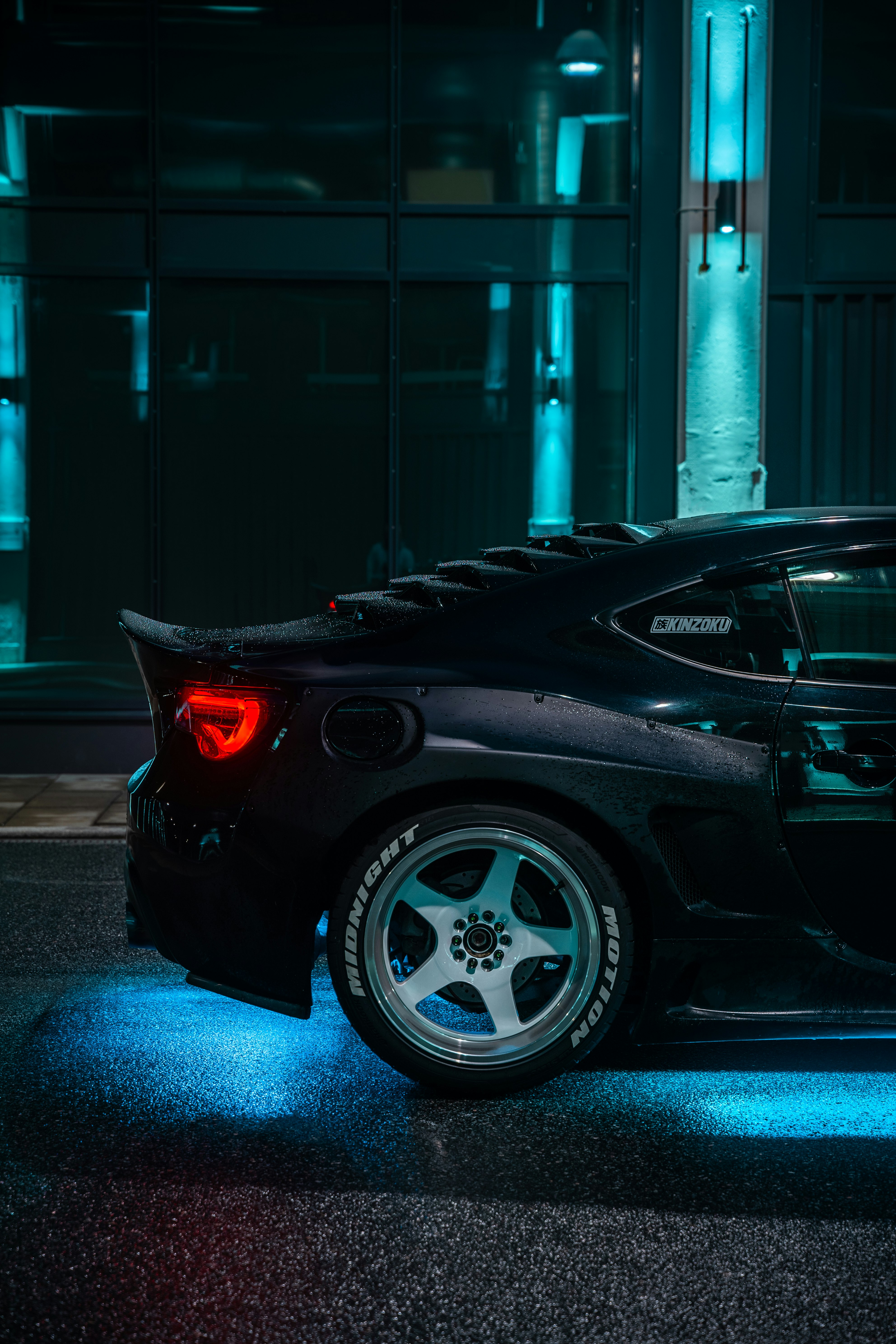 black porsche 911 parked in garage